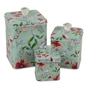Small tins line flowers